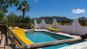 La Casita del Garrobo, Comares